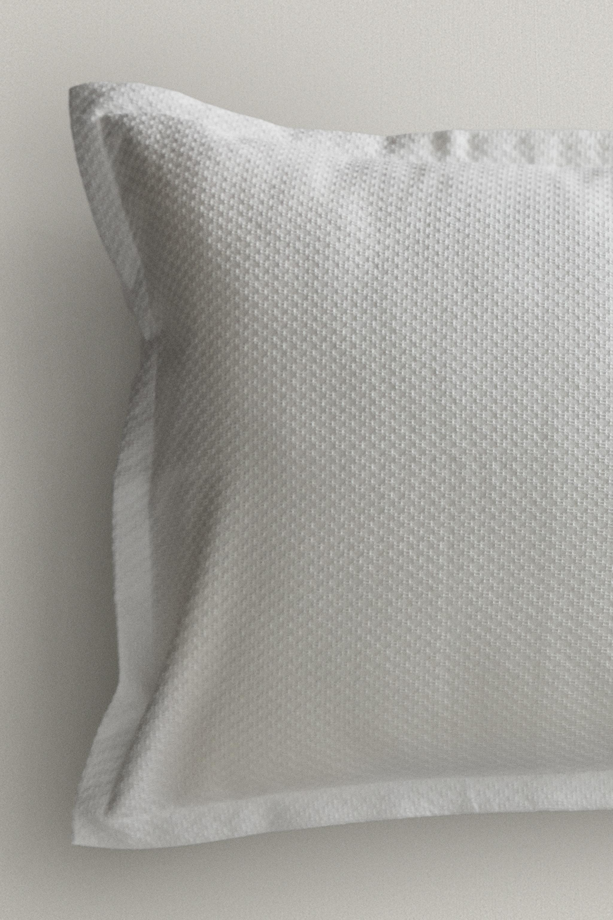 EMBOSSED THROW PILLOW COVER